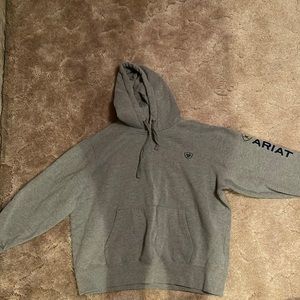 Authentic Ariat Sweatshirt in Grey with sewn navy blue branding. Smoke free home